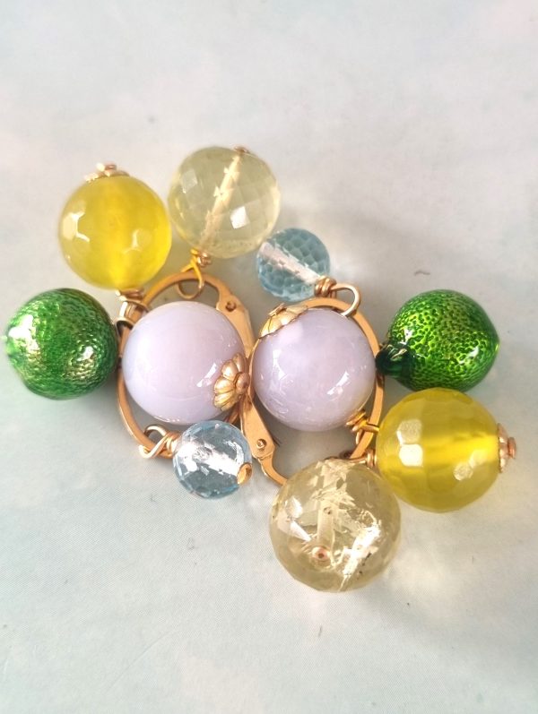 Marthje's specials van goldfilled hangers met chalcedoon, jade, lemonkwarts, topaas en een fantasiebedel