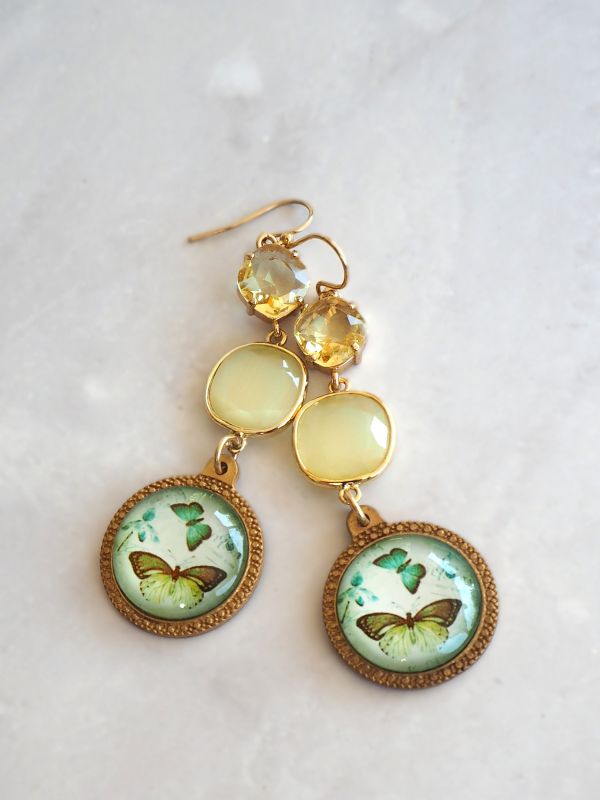 Goldfilled hangers met kristal en kattenoog