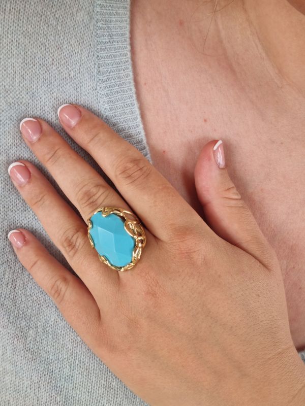Brass ring met blauwe steen, flexibele maat
