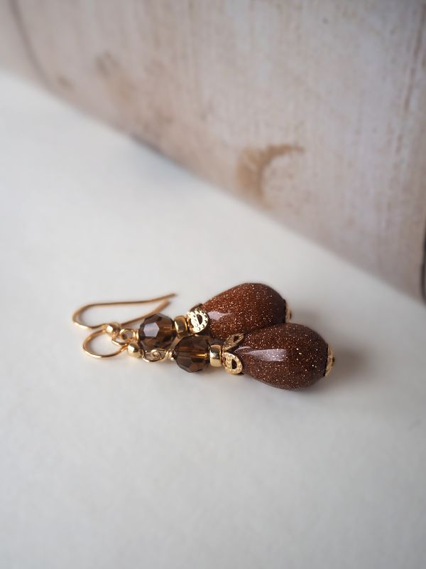 Goldfilled oorbellen met kristal en goudsteen